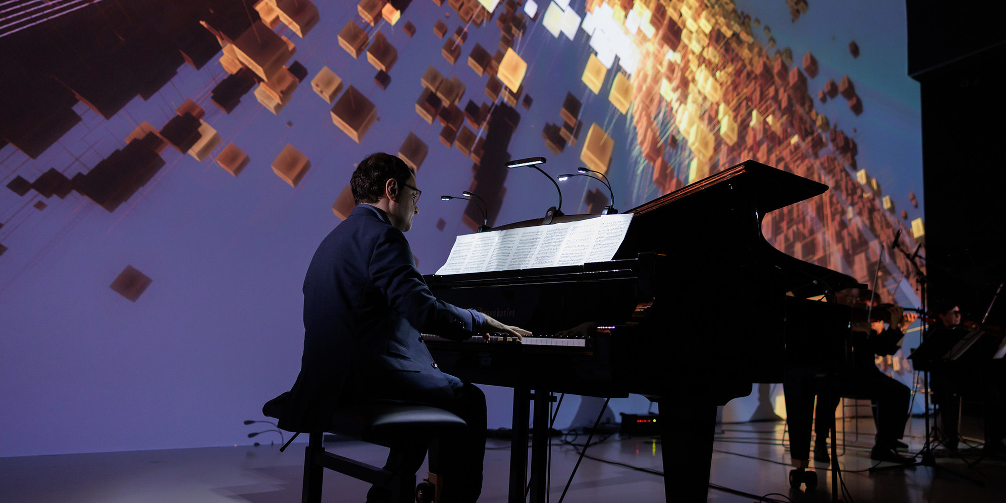 The composition "Man-Machine Music" by an artificial intelligence was performed by Ali Nikrang (AT) of the Futurelab, Cori O