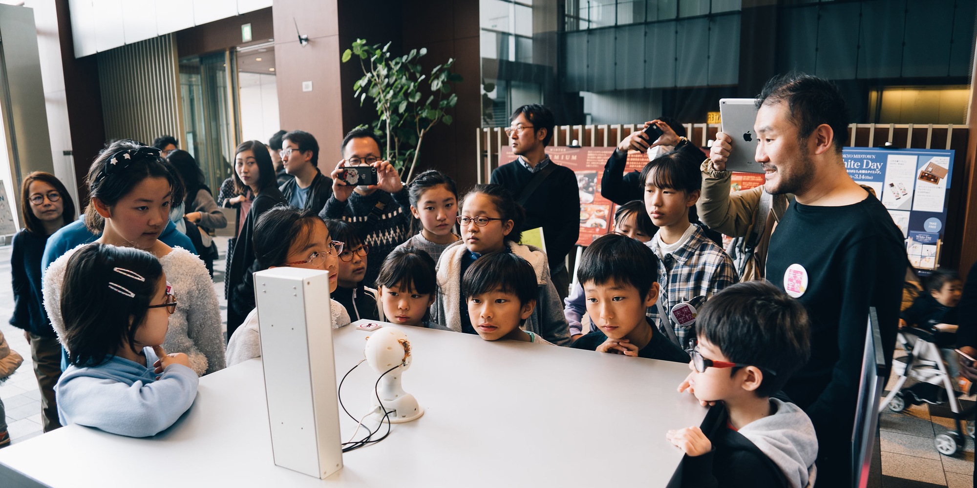 Festival visitors looking at exhibit